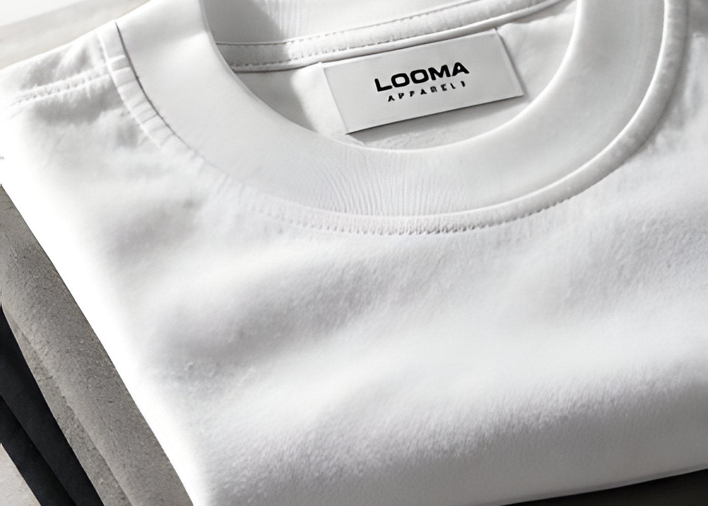 Folded Looma t-shirts ready to ship